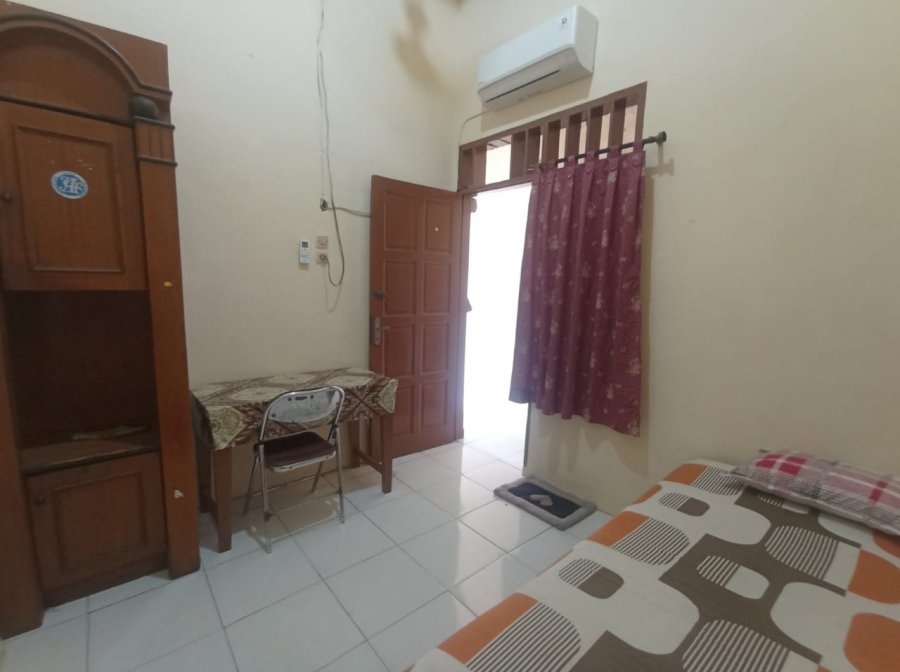 Foto 4 Three Building Kost