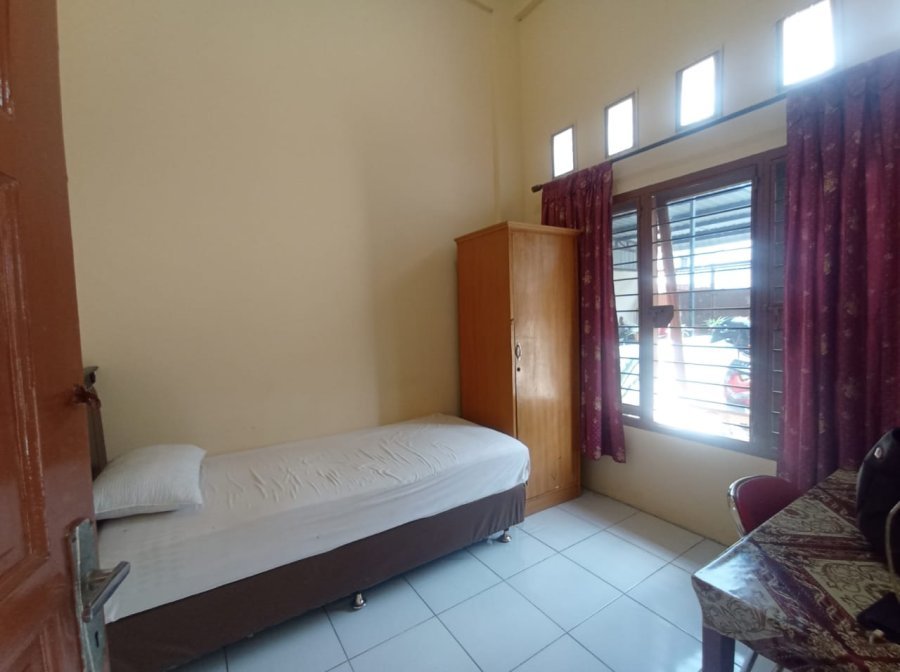Foto 5 Three Building Kost